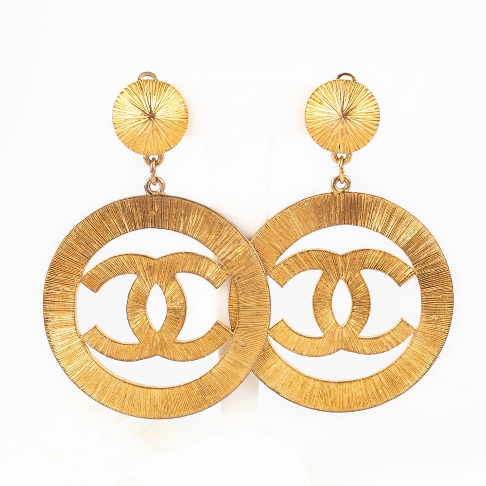 CHANEL Oversized Sunburst Earrings